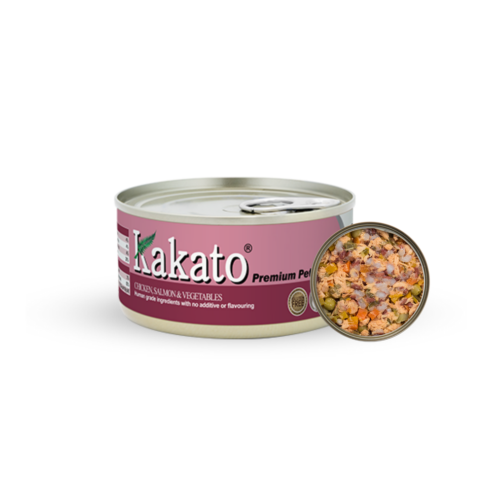 Kakato Chicken Salmon Vegetables premium pet food can with visible mixed chicken, salmon, and vegetable chunks inside.