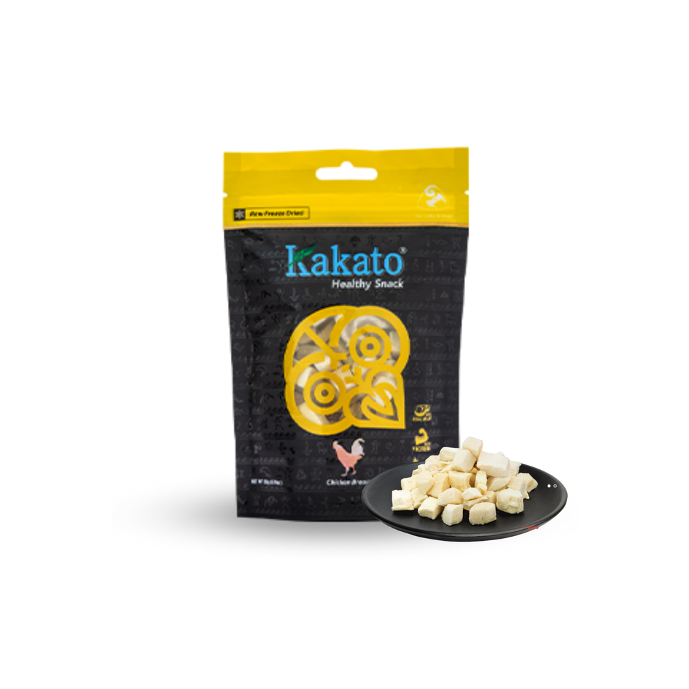 kakato freeze-dried chicken breast snacks in resealable black and yellow pouch with cubed pieces on plate